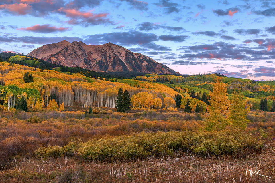 Limited edition print of Colorado’s East Beckwith Mountain under a pink sunrise with yellow aspens at its base.