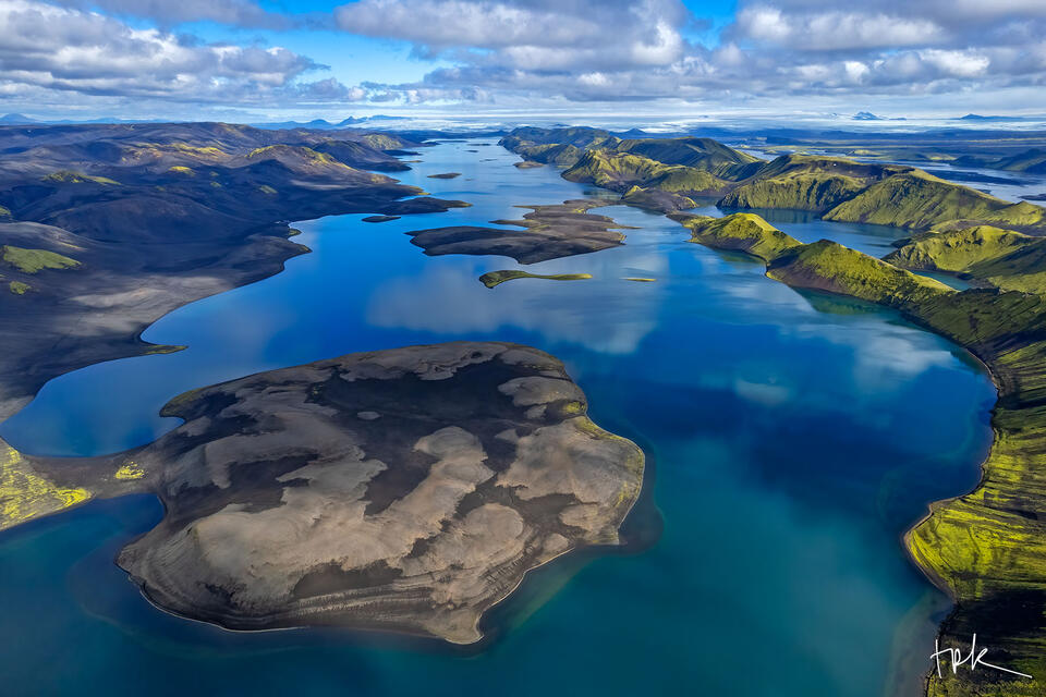 Limited edition print of the Icelandic highland lake, Langisjór, extending toward the Vatnajökull glacier in the distance under blue skies.