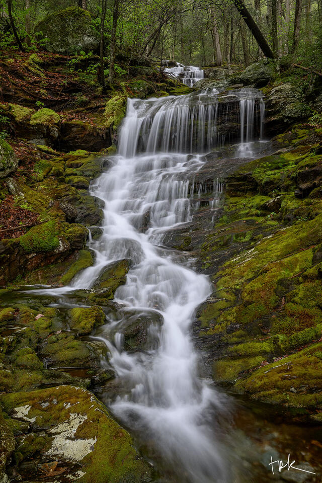 Limited edition print of the third falls on Massachusetts’s Race Brook surrounded by saturated green moss after a spring rain.