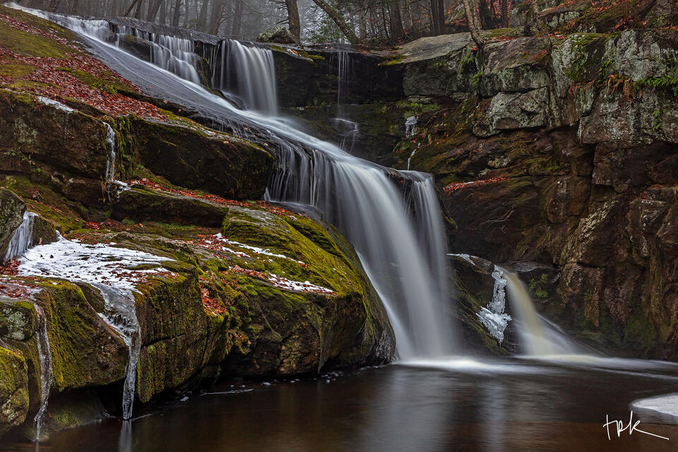 Limited edition print of the third falls at Enders Brook in Granby captured on a winter day with patches of snow and ice to the left of the waterfall.