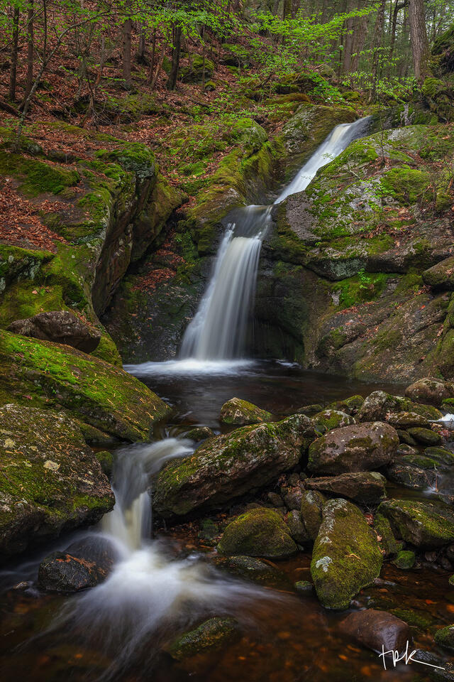 Limited edition print of a three-tiered waterfall in the Connecticut woodland in spring.