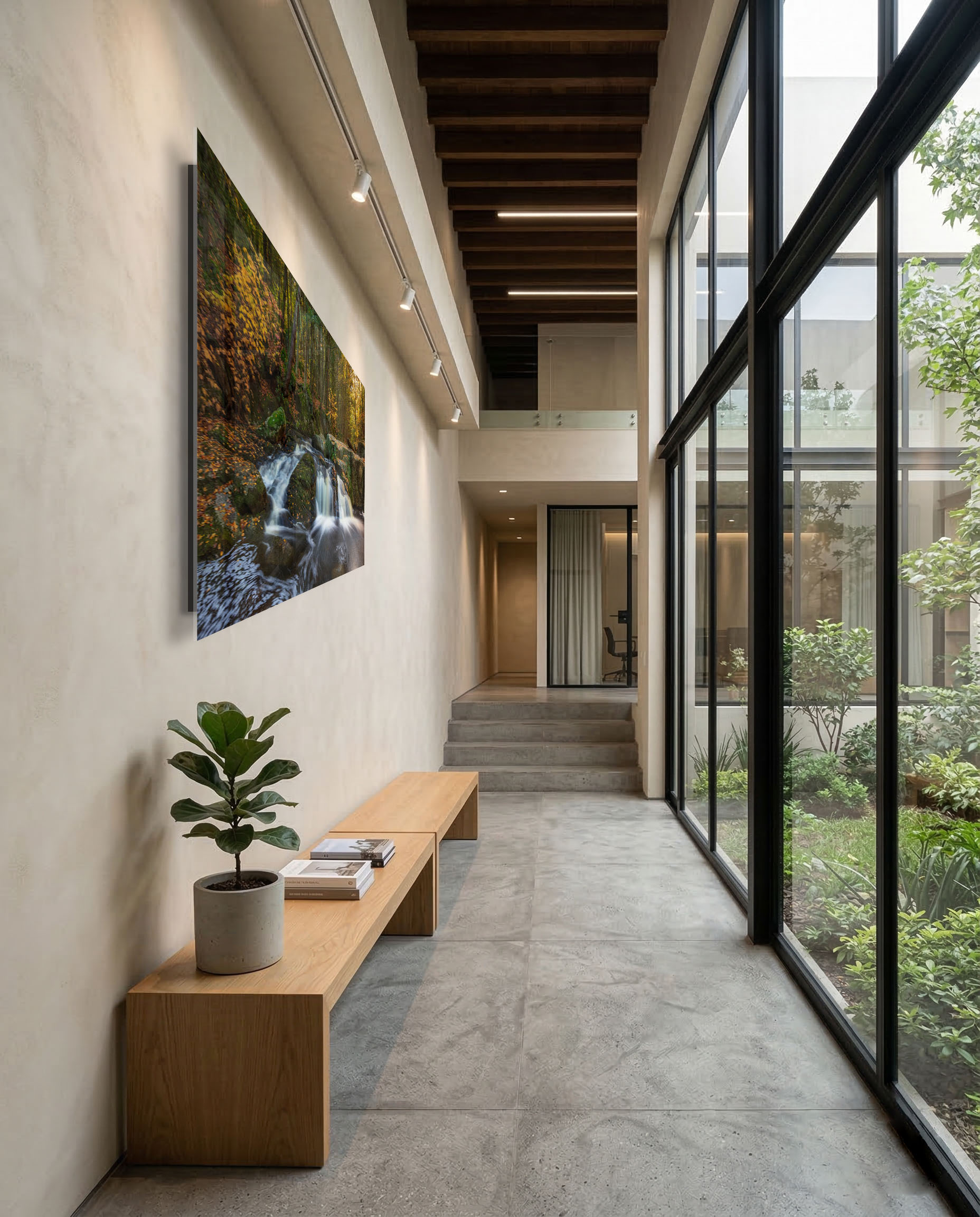 Side view of a waterfall fine art print in a modern hallway, illustrating float-mounted acrylic presentation with visible depth and wall separation.