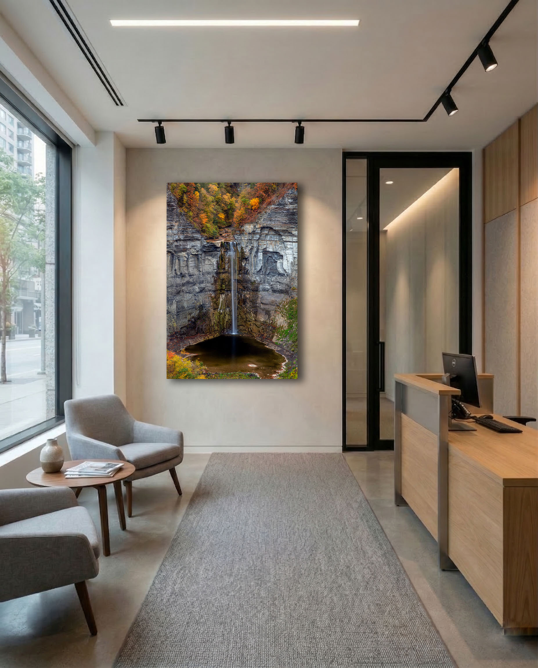 Taughannock Falls, New York in autumn fine art print displayed in an office waiting area.